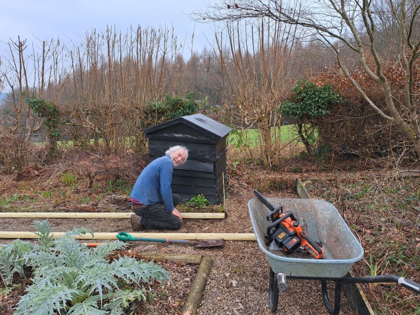 Charles at work at Veddw Garden copyright Anne Wareham